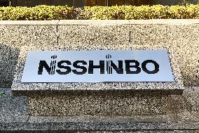 Nisshinbo Holdings Inc. signage and logo